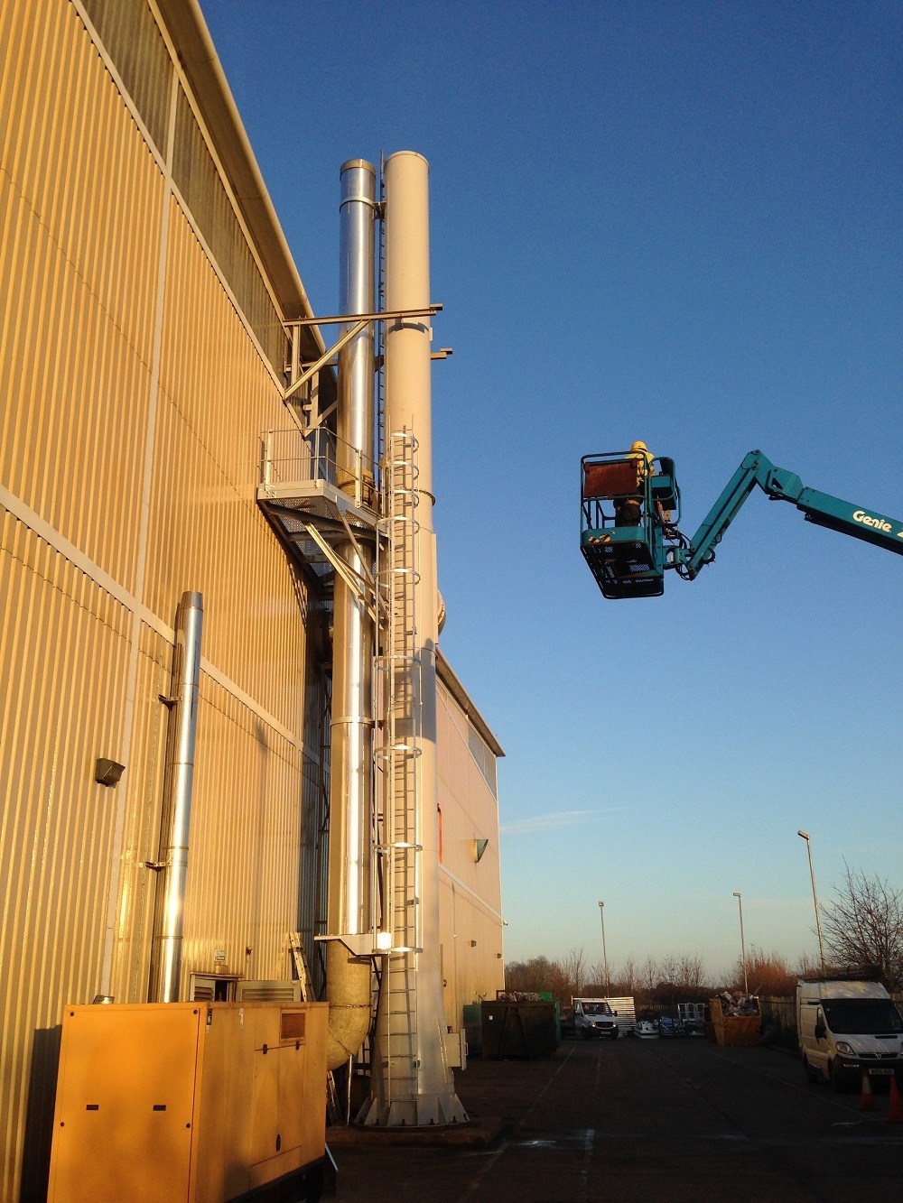 two single flue chimneys complete with M1 compliant access for monitoring